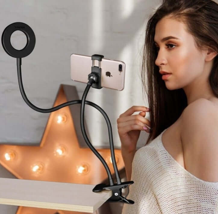 LED Selfie Ring Light with Adjustable Phone Holder in use, featuring a phone mounted on a flexible arm.